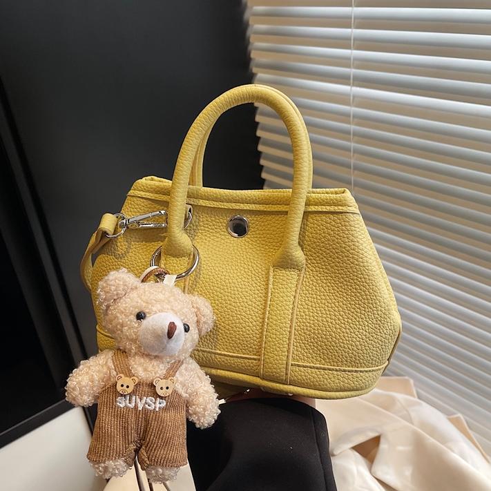 Bolsa de cubo de mano popular de verano para mujeres 2025 nuevo bolso de hombro super caliente universal nicho super caliente mochila