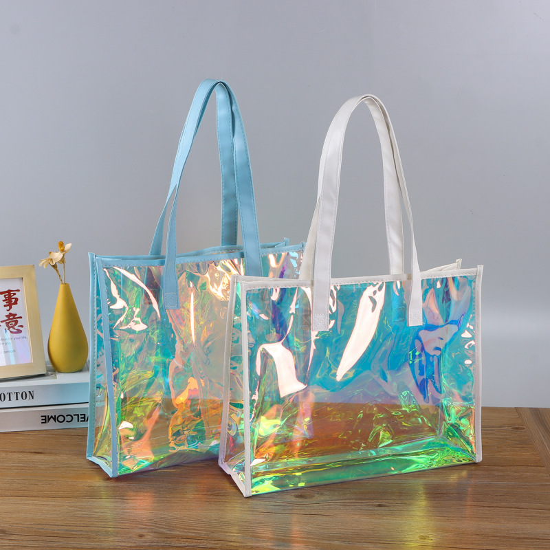 炫彩pvc镭射手提袋现货 tpu透明皮革手提袋 服装店广告宣传手拎袋