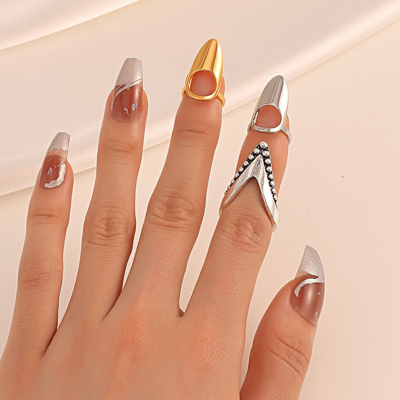Cafe billion European and American jewelry personality Internet red with pointed nail ring women's trend temperament nail set small department store wholesale