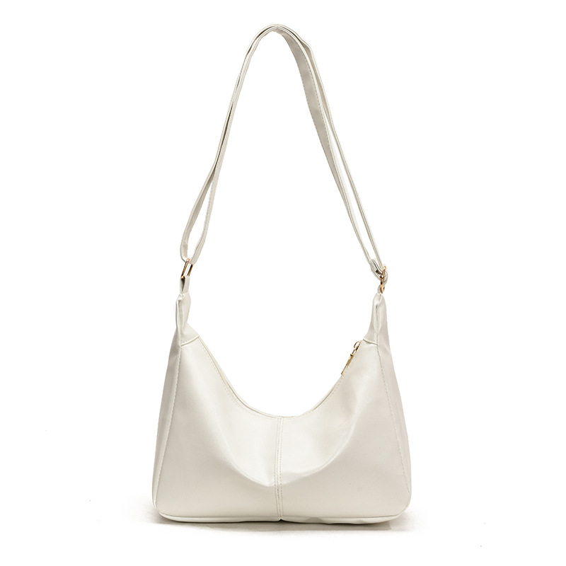 Color sólido textura de cuero suave hombro mochila para mujeres 2025 primavera nueva literatura y arte bolsos casuales bolsos especiales de moda