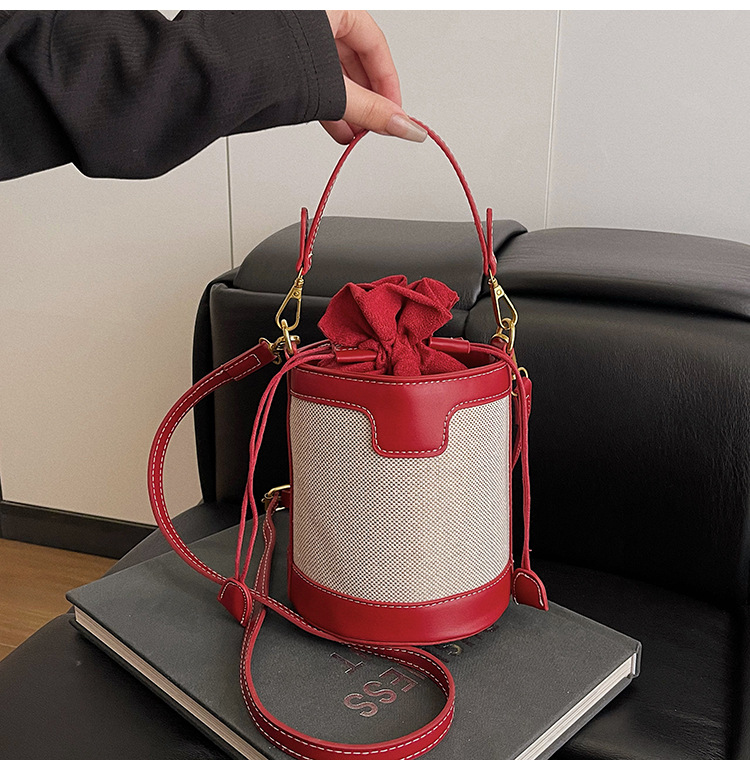 Bolso de mano cilíndrico de color contrastante para mujer, novedad 2026, estilo transfronterizo del Sudeste Asiático, a la moda, bandolera de un solo hombro