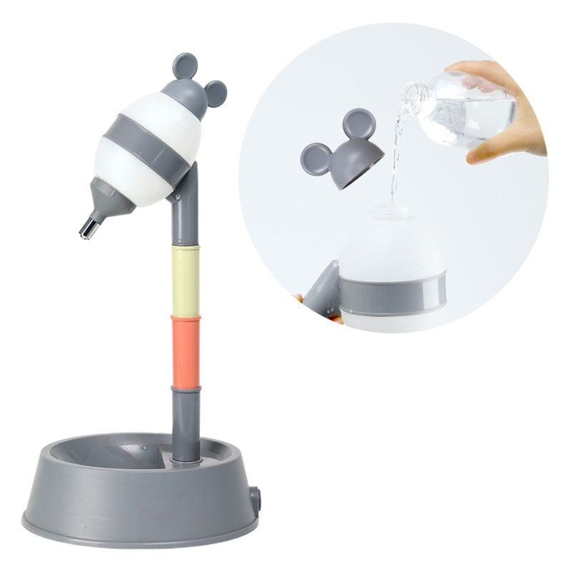 Dispensador de agua integrado para mascotas perro cuenca alimentación gato dispensador de agua vertical perro hervidor de agua de alta Festival Bola de lamer dispensador de agua