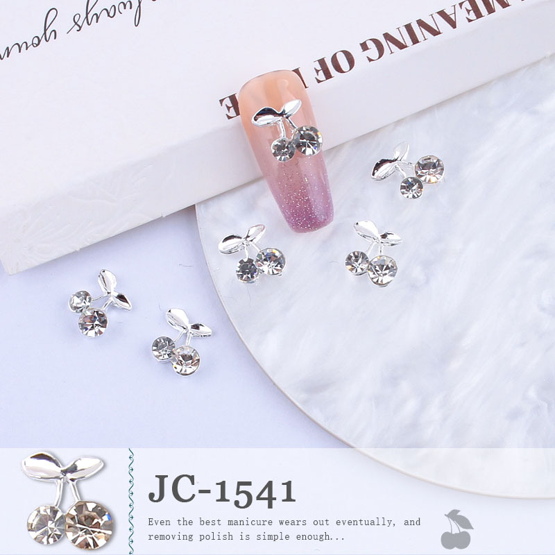 Venta caliente transfronteriza joyería de uñas al por mayor goteo cereza aleación diamante verano lindo fresco Super flash clavo diamante