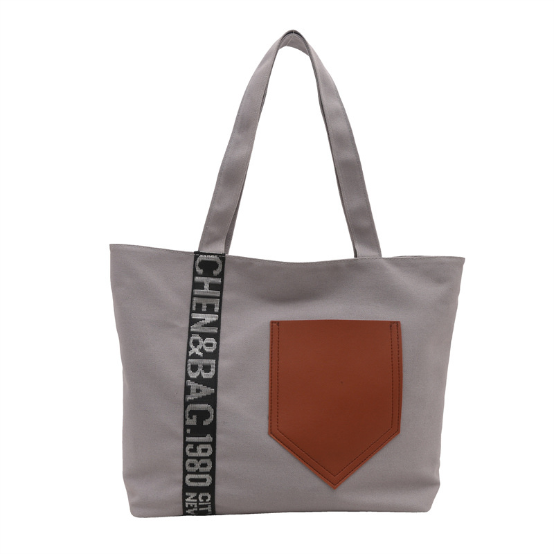 Bolso de mujer 2024 invierno nuevo bolso de gran capacidad de transporte de lona bolso de brazo de moda simple bolso de hombro