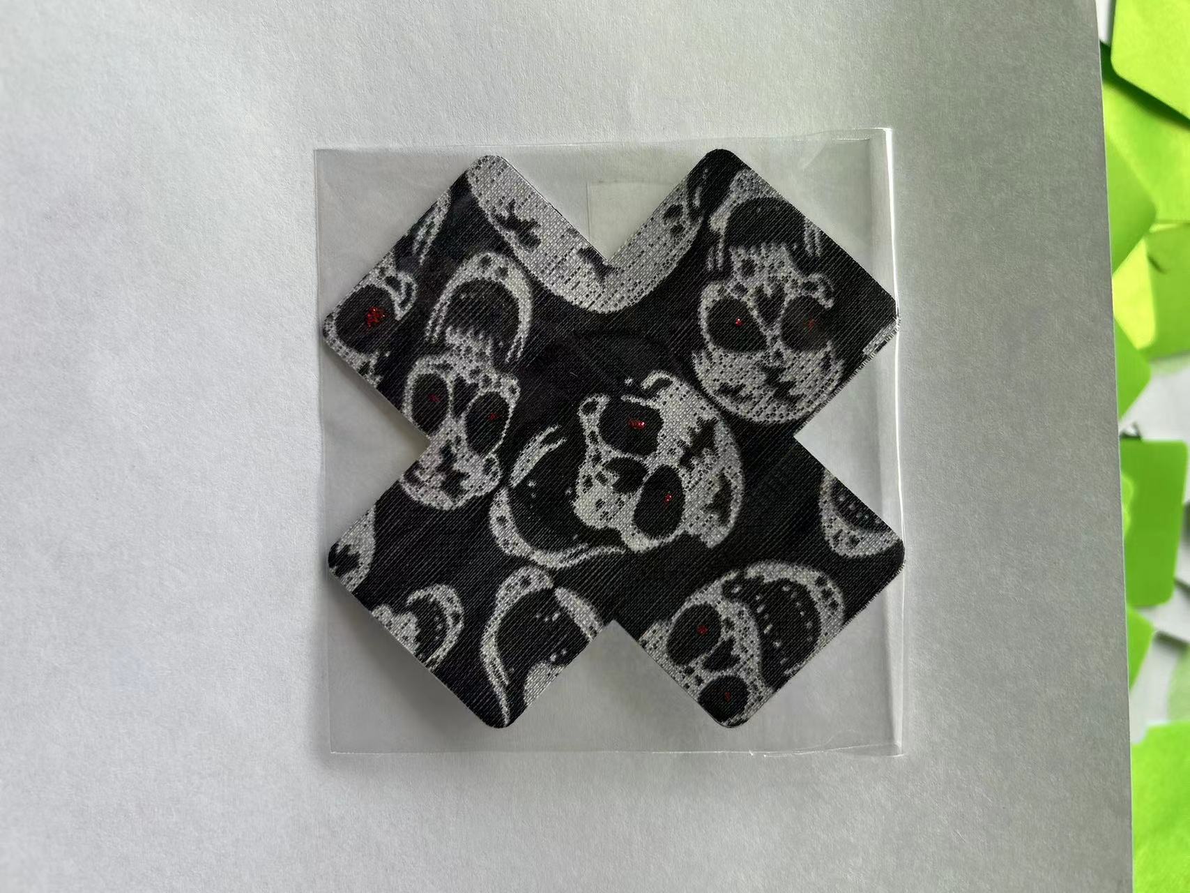 Venta caliente transfronteriza europea y americana sexy impreso mama pegatinas desechables en forma de X pecho Nipe cubre