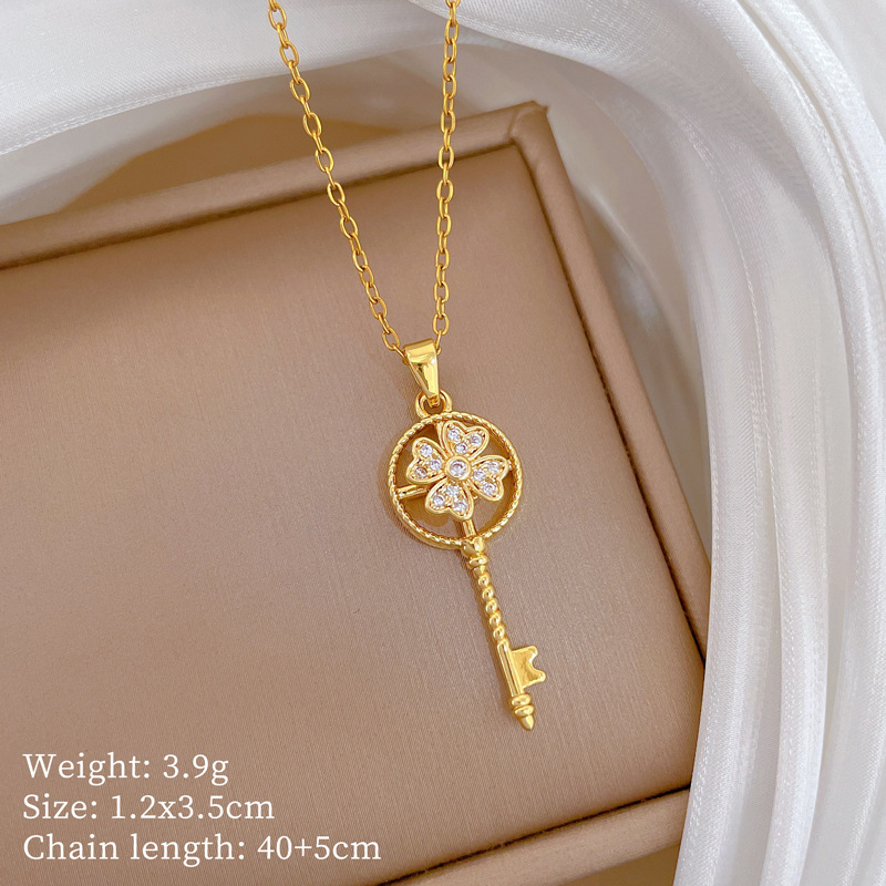 Luxurious Rotating Lucky Key Necklace With Full Diamond Inlay_voghion.com