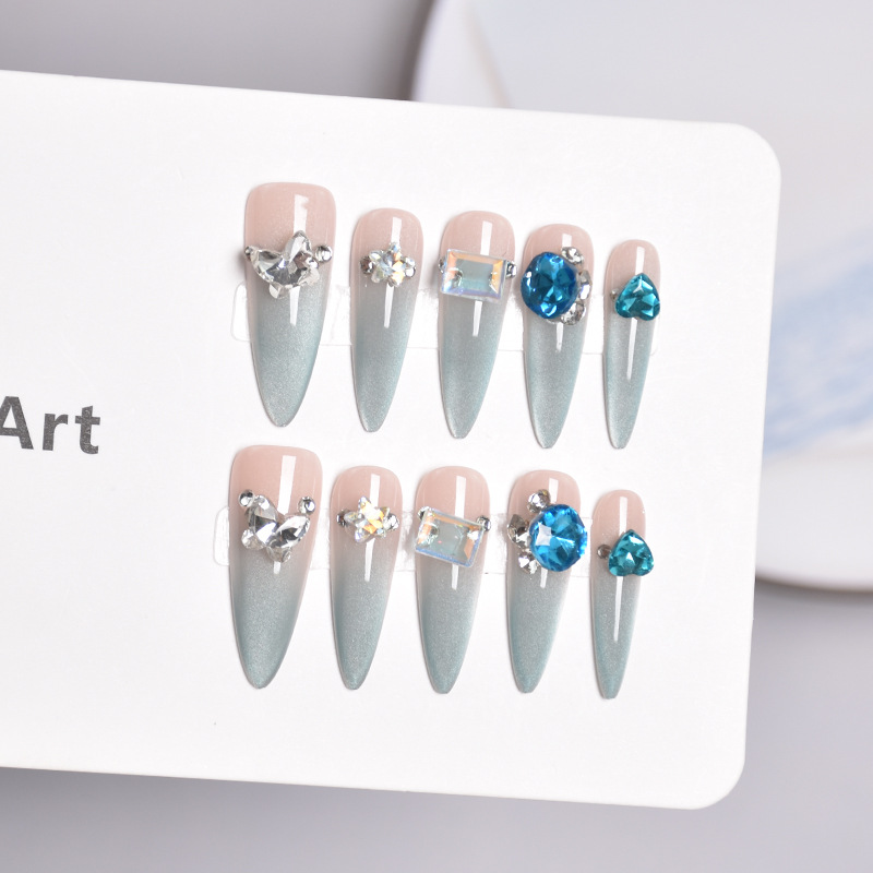 10 nuevas piezas de arte de uñas, ojos de gato azul claro, piezas de uñas de vestir, uñas de punta larga terminadas, pegatinas hechas a mano de la industria pesada, parches de uñas de diamantes