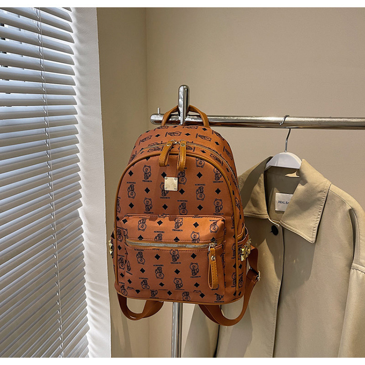 A cute little bear backpack for female college students in 2025, a new fashionable and trendy backpack with a large capacity undefined