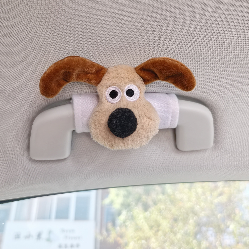 Perro de peluche maneja de automóvil maneja de automóvil masculino y femenino maneja de puerta interior cubierta guante de techo