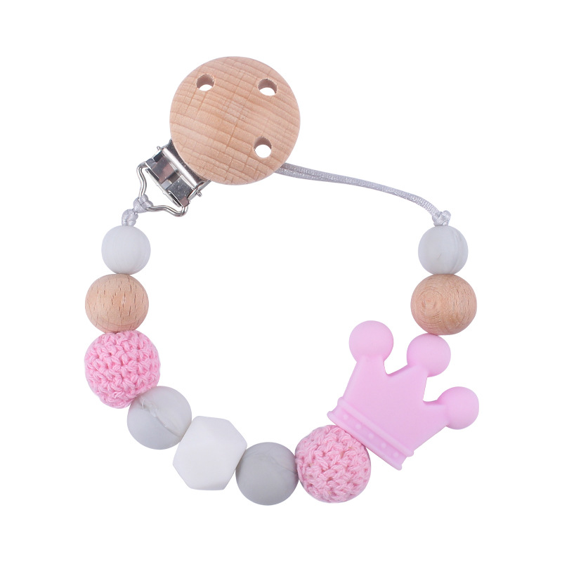 Suministros para bebés calmante clip de chupete de haya bebé anti-caída de la cadena de dibujos animados corona de silicona perlas mordedura molar chupete cadena