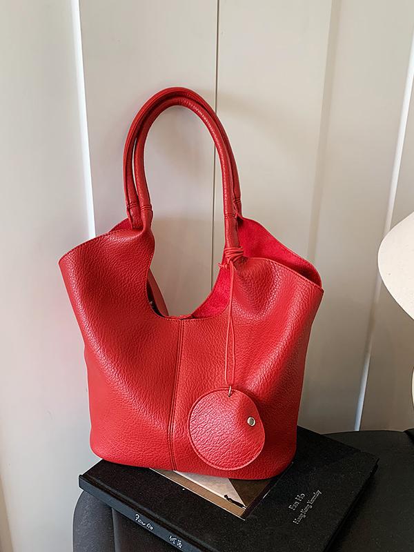 Bolso de cubo de axila de estilo explosivo transfronterizo para mujer 2025 nuevo bolso de hombro de cuero suave de viajero salvaje simple bolso de niño y madre de todo fósforo