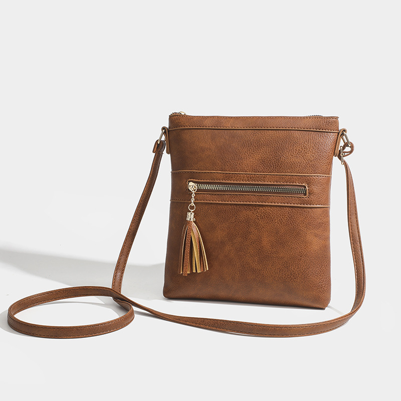 Dames schoudertas in retrostijl met kwastje en ritssluiting_voghion.com
