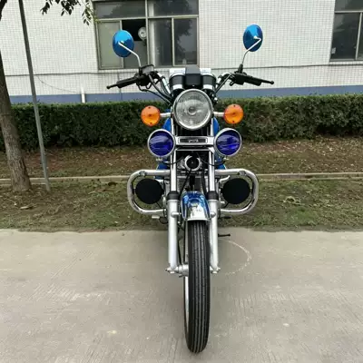 Blue two-wheeled motorcycle with a stylish, Motosikletlər