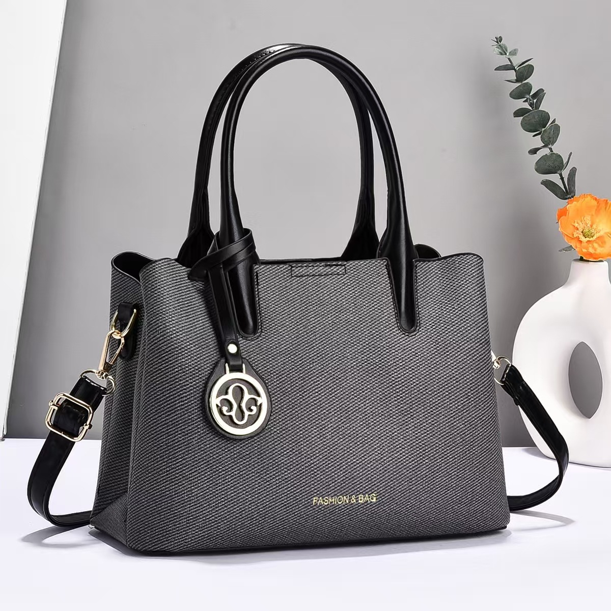 Bolso de mano universal nuevo bolso de hombro de moda bolso de mediana edad bolso de madre bolso de transporte casual bolso de mano