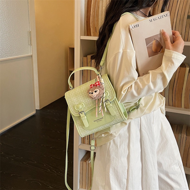 Mochila universitaria popular para estudiantes mochila casual de mujer estilo a cuadrícula nicho 2026 escuela de moda de verano nuevo estilo