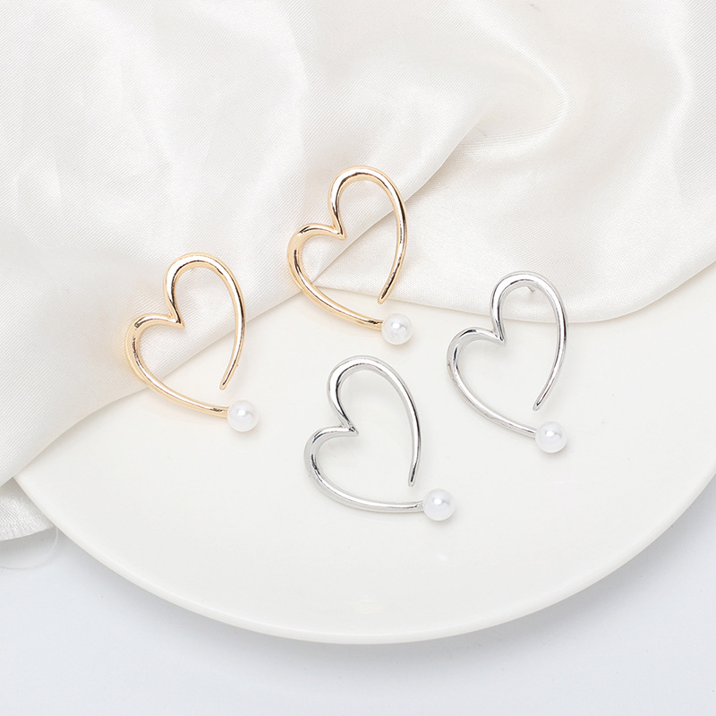 6g Weight Earrings Classification Wedding, Travel Occasion Women'S Gender Gold, Silver Color Wholesale Jewelry Irregular Hollow Heart Pearl Stud Earrings Nihaojewelry 2