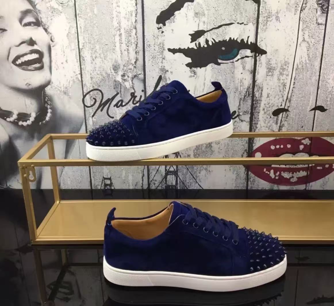 Estación europea cl remaches eléctricos zapatos de suela roja de tendencia universal remaches pareja de moda casual zapatos casuales de moda europea