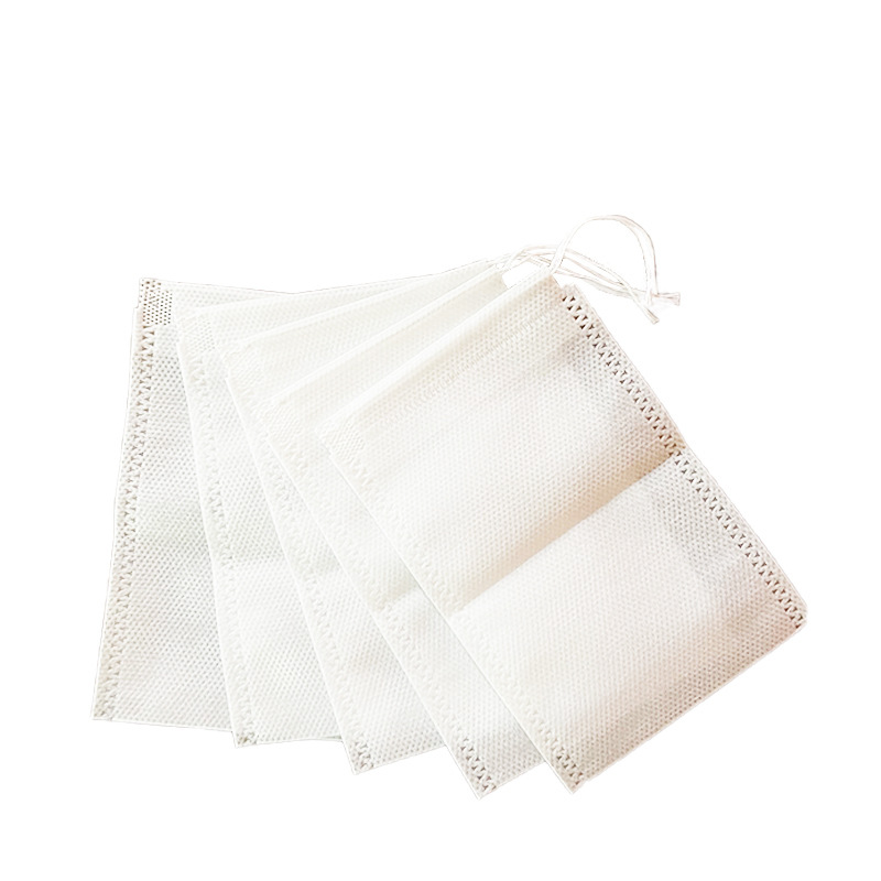Especificaciones completas Tela no tejida desechable termosellado 100 piezas Bolsa de filtro termosellado Bolsa de bolsa de té Bolsa de decocción Bolsa de baño de pies