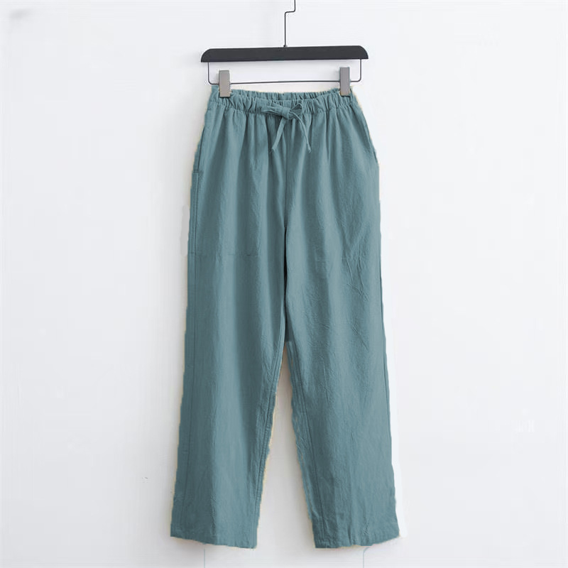 Светло-зеленые брюки