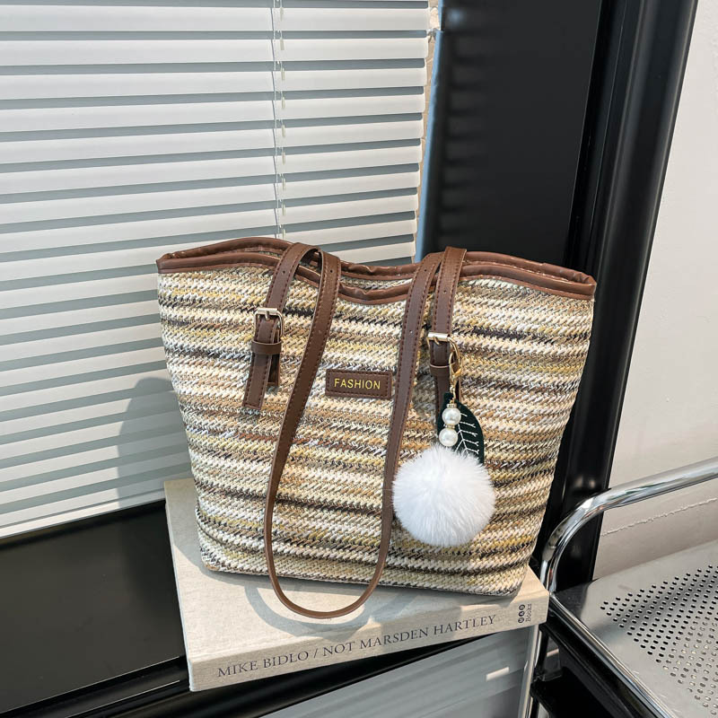 2026 nuevo arco iris trenzado bolso de hombro de gran capacidad de mujer bolso de paja de viaje universal mano de moda rayas