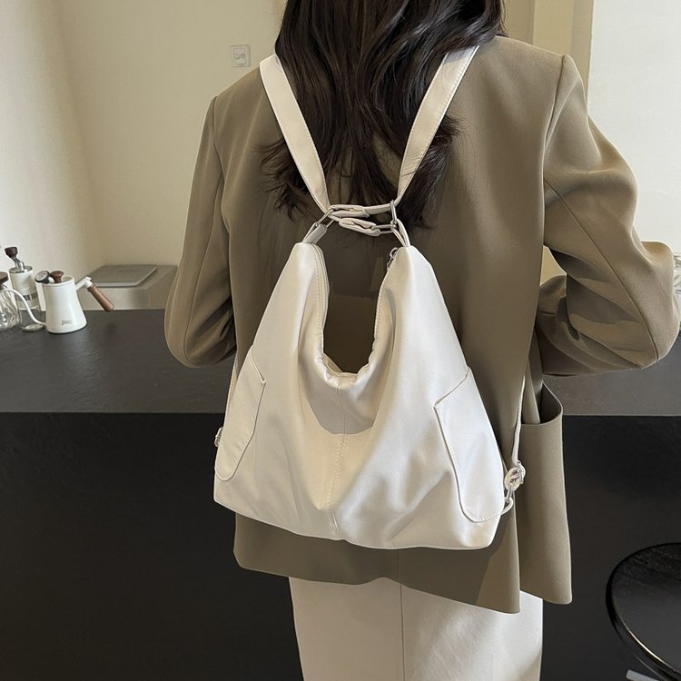 Solo bueno, vale la pena llevar sus hombros, resistente al desgaste, gran capacidad, elegante y ligero