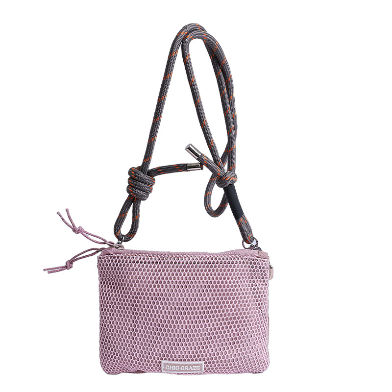 Bolsos pequeños de moda coreana 2025 verano nuevo estilo bolso femenino bolso de hombro de malla hueca bolso de mensajero de letras casuales marea