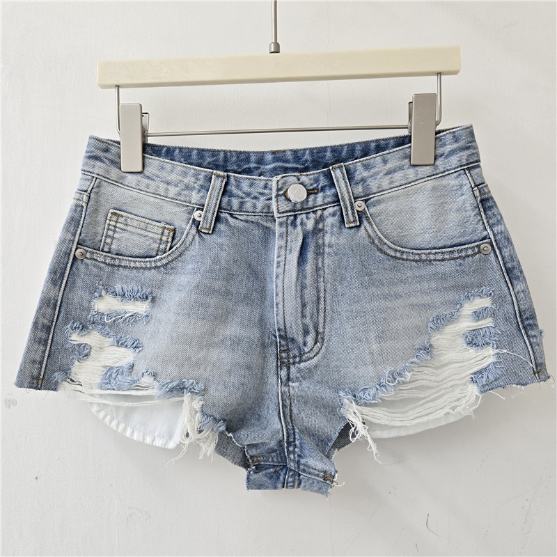2026 Summer New Hot Girl Style Slimming A-Line Hot Pants with Ripped Decoration High-Waisted Trendy Denim Shorts for Women 2026 Summer New Hot Girl Style Slimming A-Line Hot Pants with Ripped Decoration High-Waisted Trendy Denim Shorts for Women