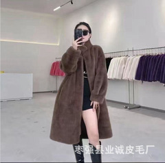 新型ミンクの毛のような女性の立襟の長いコートは秋冬に厚くてゆったりしています。