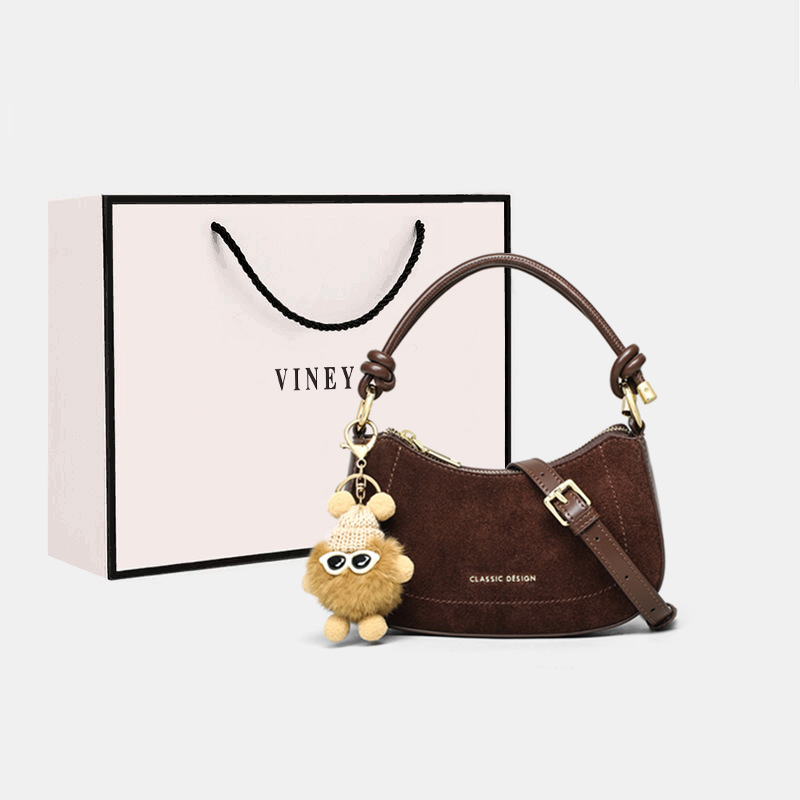 Bolso de mano 2026 nuevo bolso de cuero de verano retro sensación de alto nivel brazo bolso de hombro de media luna bolso