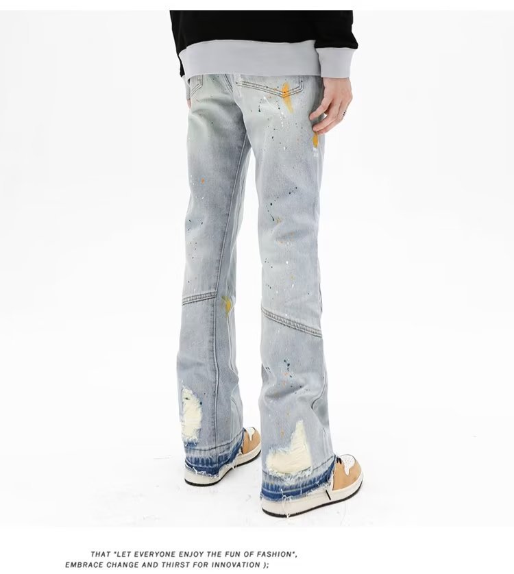 Jeans uomo slim fit stretch con strappi e taglio micro flare_voghion.com