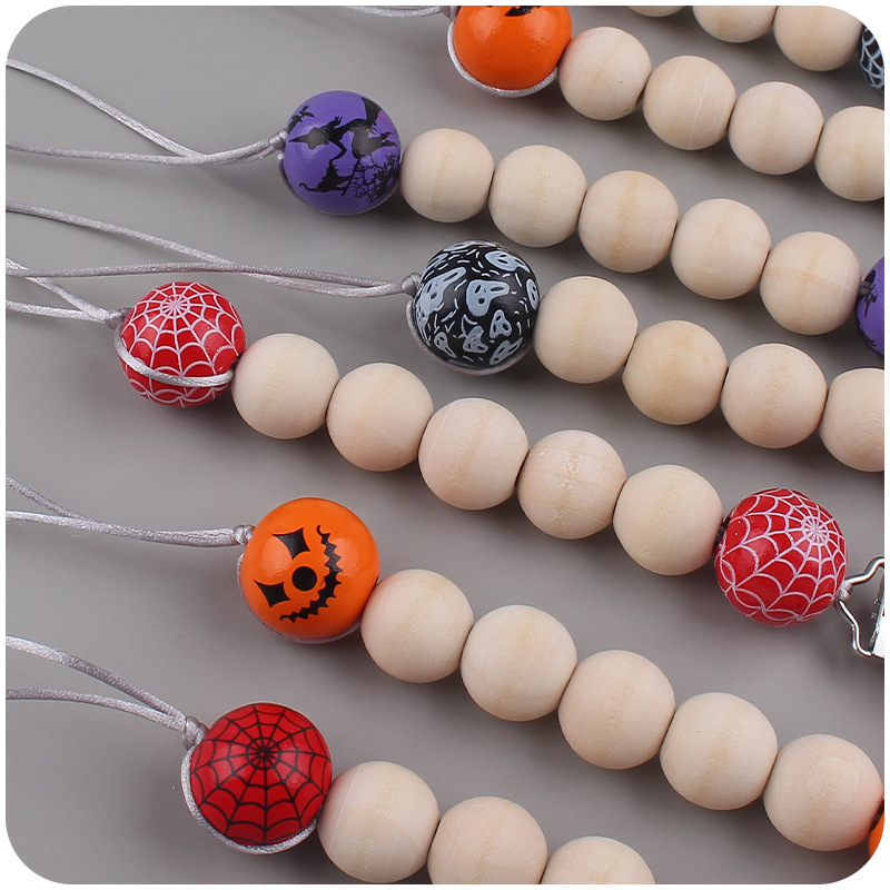 Nuevos suministros para bebés Hemu chupete Cadena de dibujos animados de Halloween patrón de madera cuentas Cadena de chupete cadena anti-caída