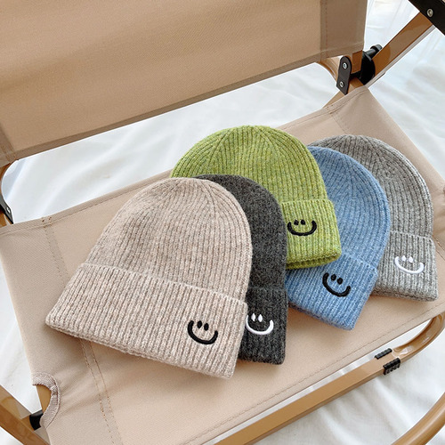 Baby smile knitting hat cream color series baby autumn winter Korean toddler baby rolled edge warm knitting hat cold hat