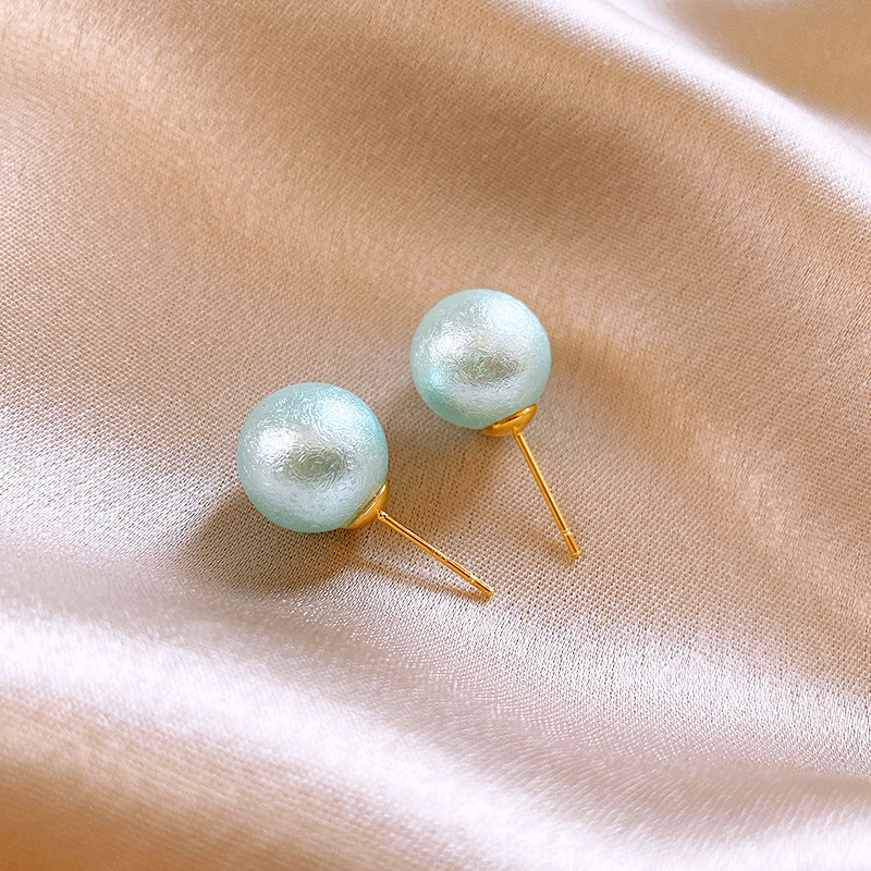 Pendientes de mariposa plisados de circón con aguja de plata Pendientes pequeños y frescos de moda simple Pendientes ligeros de lujo de alta gama al por mayor