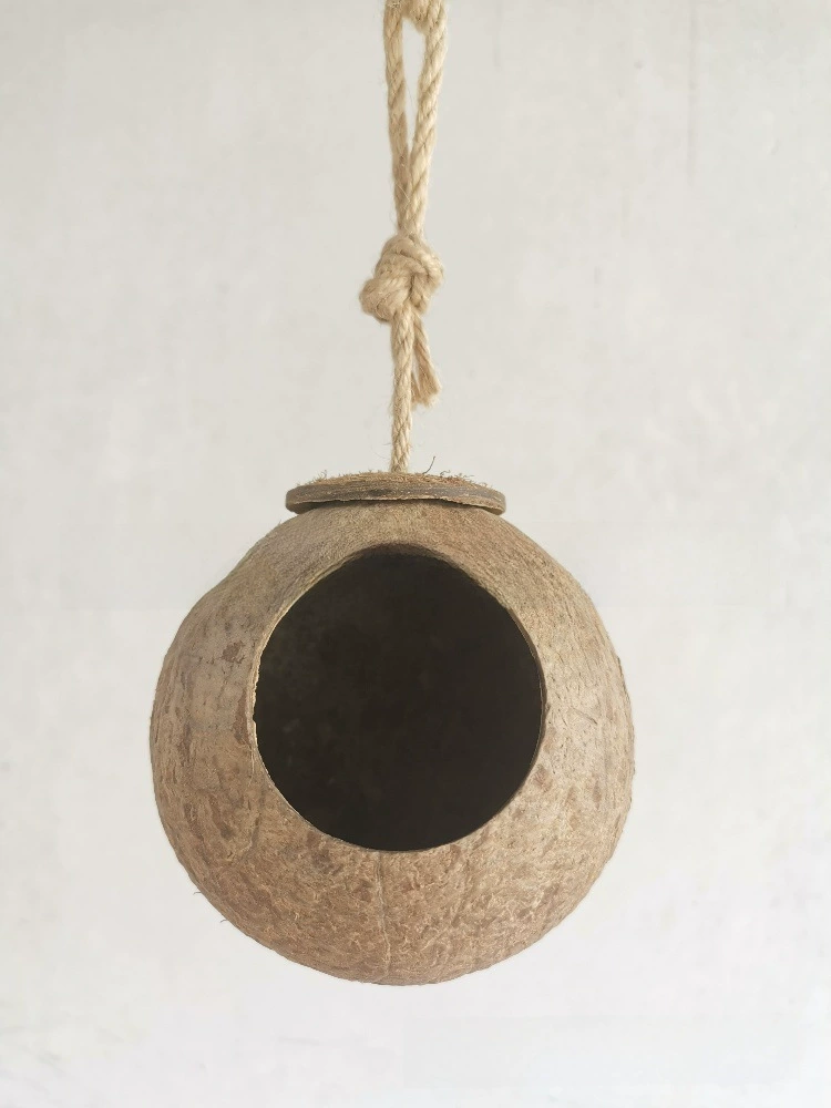 A new type of coconut shell bird nest bird cage breeding box peony tiger leather parrot bird nest wood house