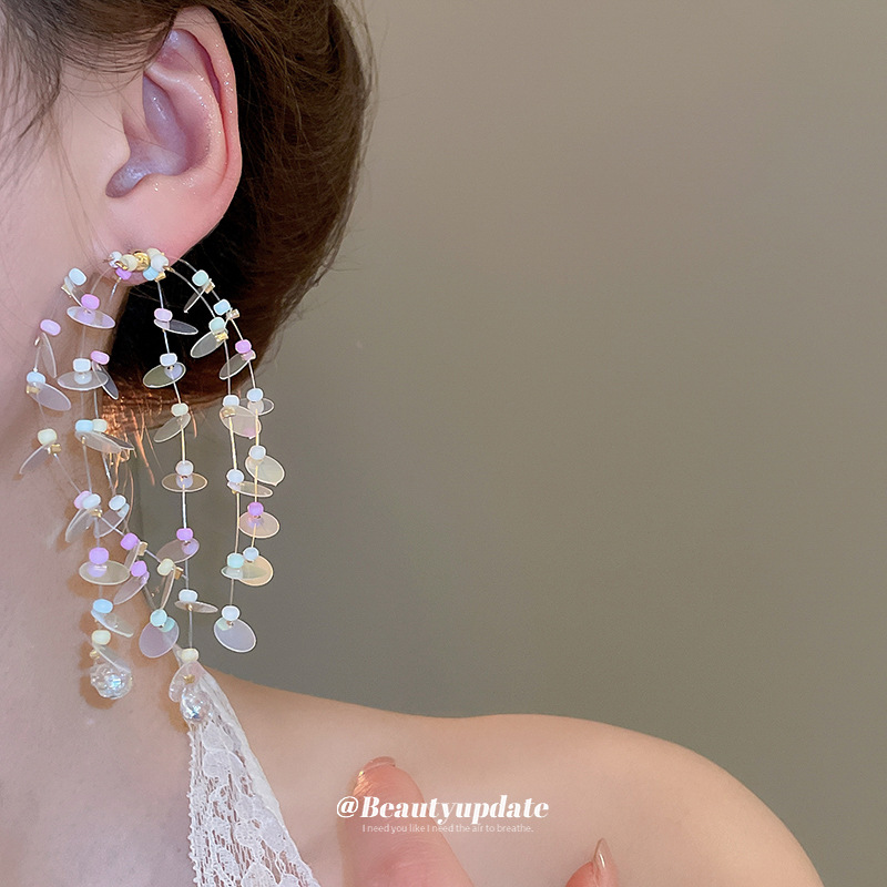 Pendientes de borla de cuentas de arroz de color de dopamina con aguja de plata Nuevos pendientes de todo fósforo Pendientes de niña dulce Sensación avanzada de nicho