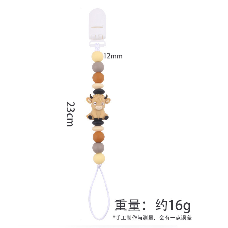 Productos infantiles de dibujos animados tridimensionales de vaca anti-caída cadena creativa bebé DIY silicona mordedor de goma molar calmar la cadena de tetina