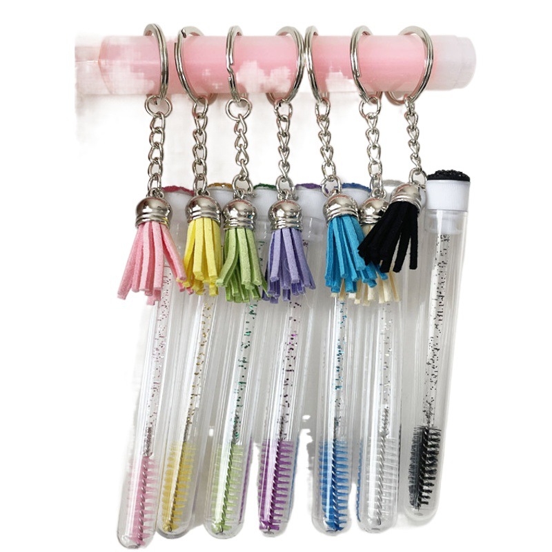 2022 nuevo producto con borlas y llavero tubo cepillo de pestañas tubo independiente cepillo de pestañas postizas rizador de diamantes multicolor