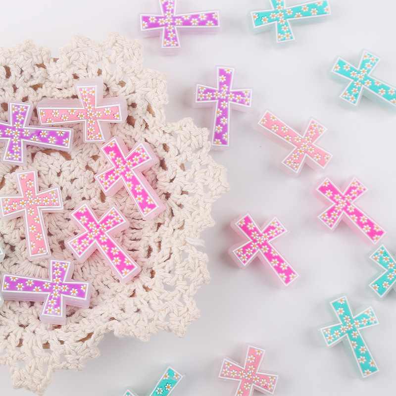 Nuevos productos para bebés Cruz de dibujos animados pequeño mordedor creativo bricolaje bebé molar chupete anti-caída de la cadena accesorios