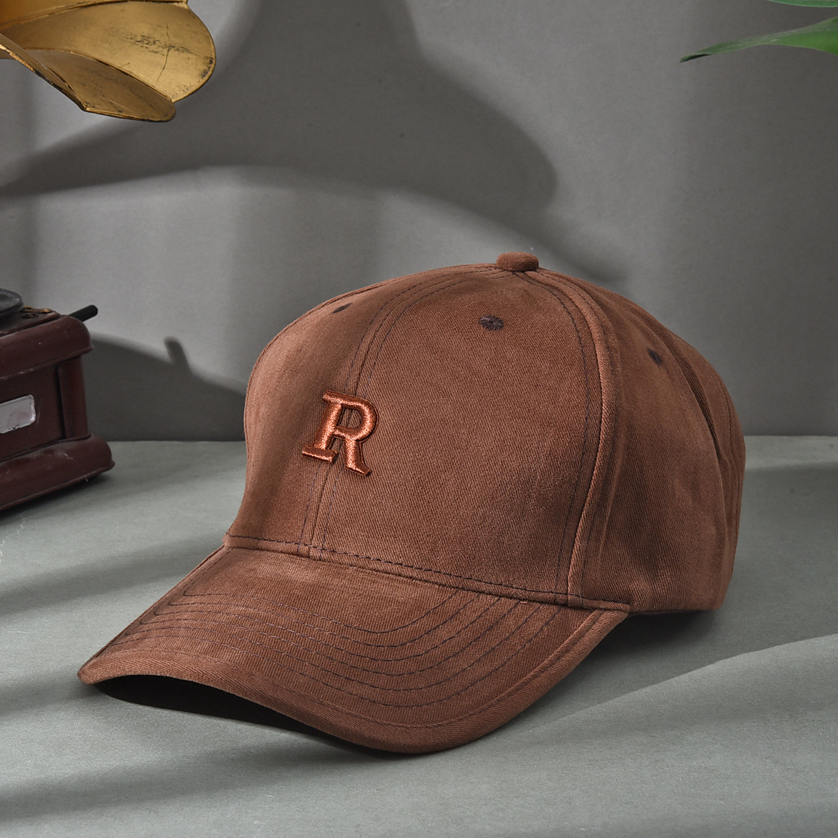 Versión de elevación R sombrero de estilo coreano sombrero de béisbol molido sombrero de béisbol de otoño y invierno sombrero de boca de pato cara pequeña