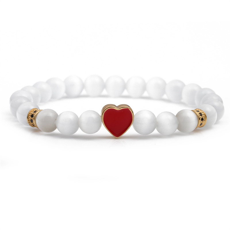 Europea y americana simple transfronteriza ópalo blanco pulsera de cuentas de cobre micro incrustaciones de aceite gota en forma de corazón pulsera de pareja femenina