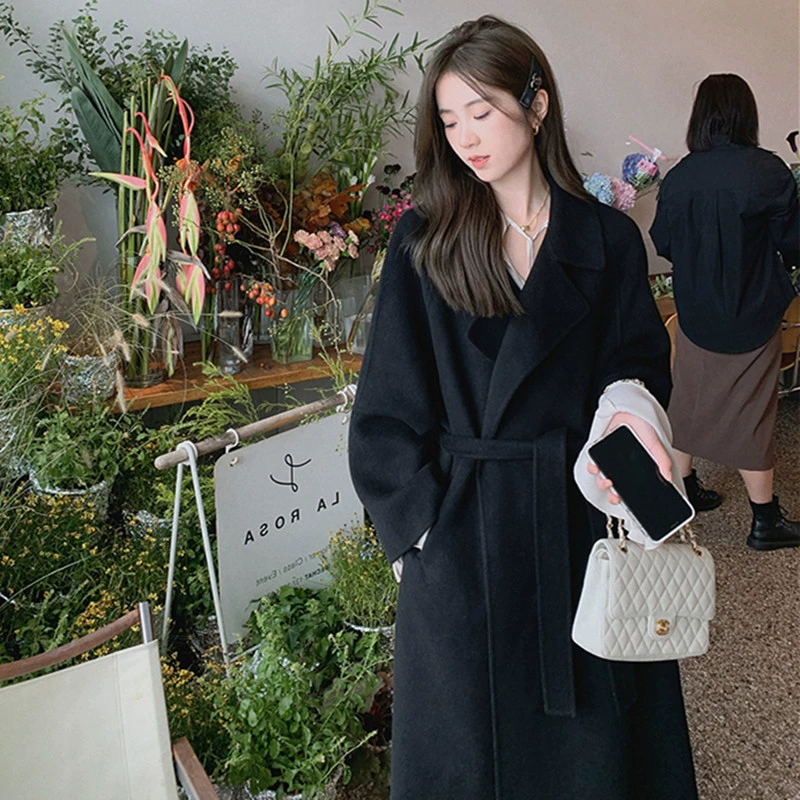 Двустороннее кашемировое шерстяное пальто женский осень и зима 2024 новая средняя длинная модель высокого уровня чувство корейского шерстяного пальто черный