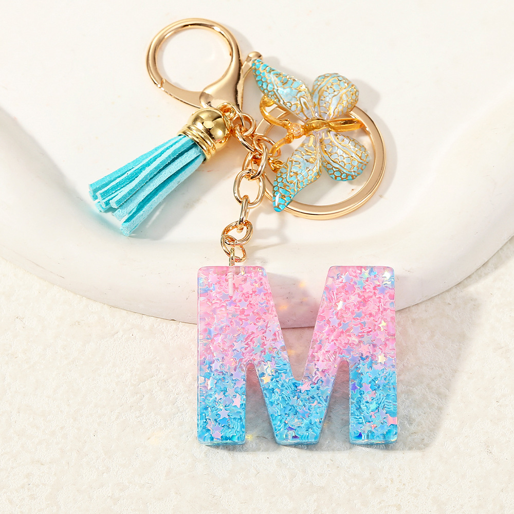 Europa y los Estados Unidos transfronterizos nuevos cristal sequinado goteo de goma letras inglesas joyería llavero y bolsos colgante apoyo al por mayor