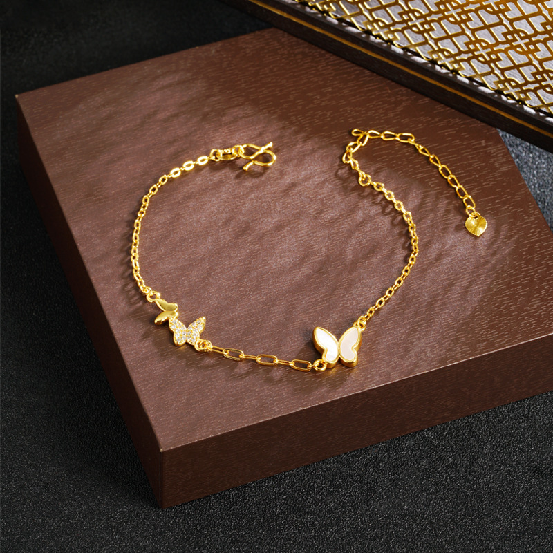 2024 nuevos productos lujosos pulseras mariposa de frita coreana simple vietnamita color de oro de arena micro-incrustado nicho de diseño suministro