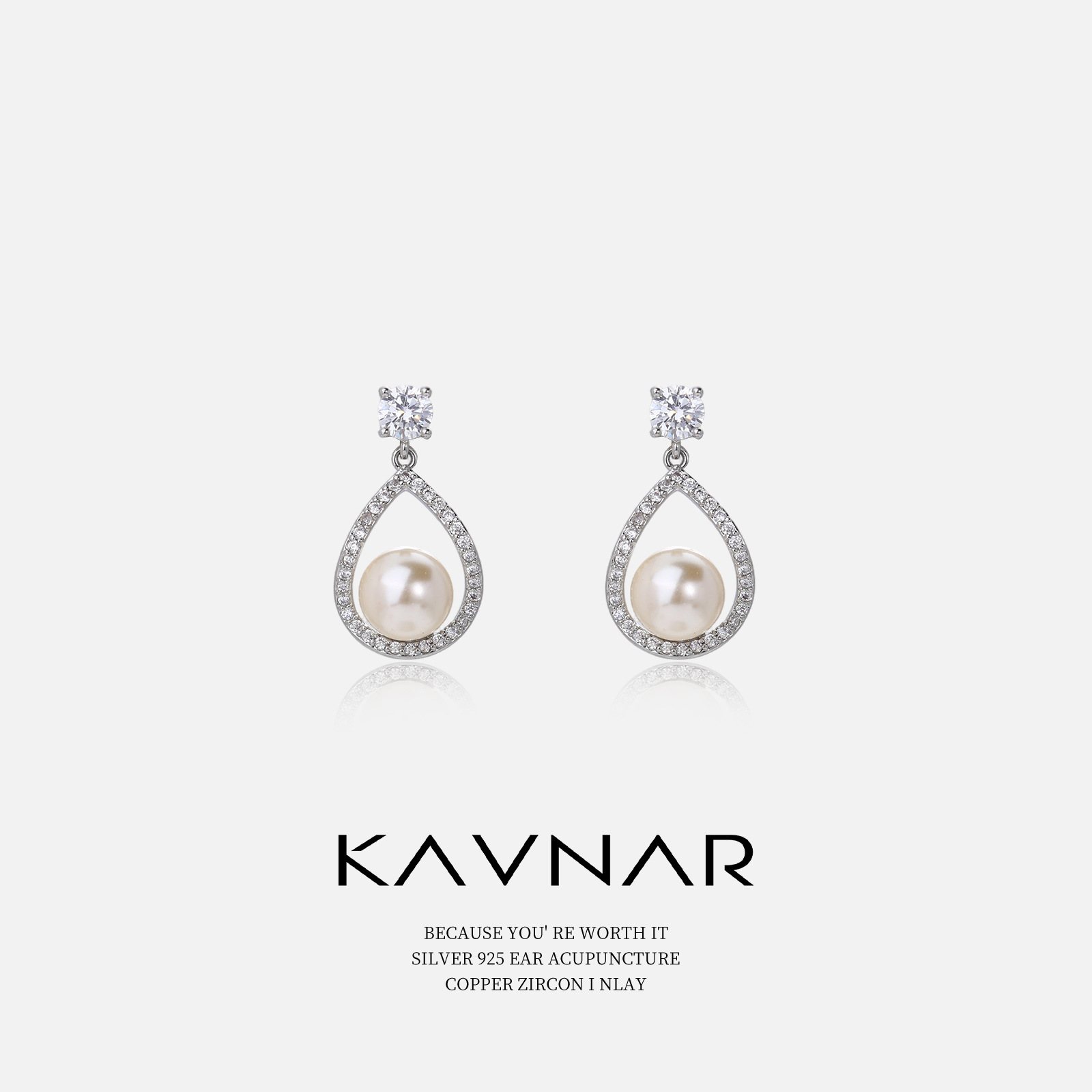 Fashionable elegant earrings drop-shaped with zircon from pearl