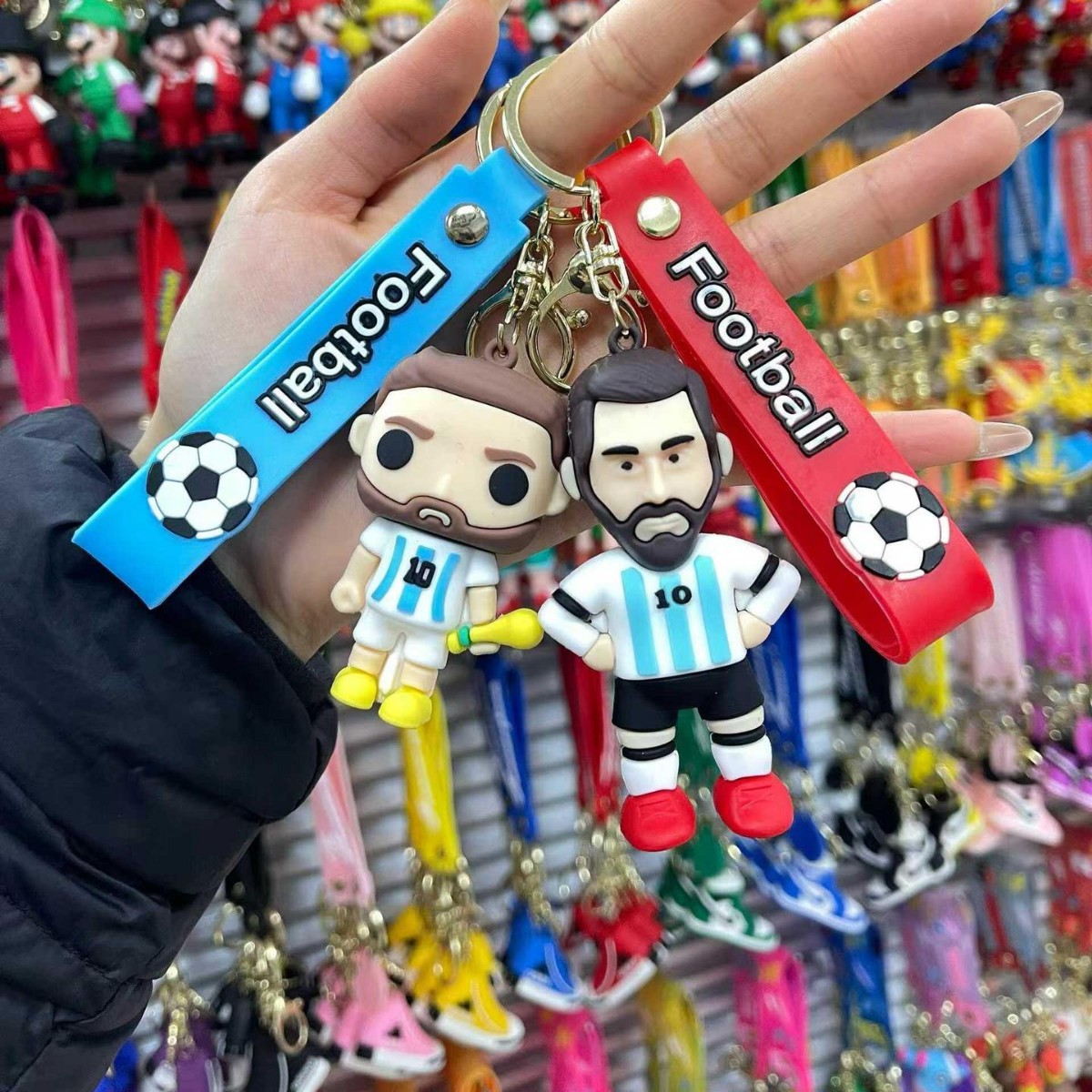 Transafronteriza venta en caliente bonito conejo de fútbol tigre ternera llavero bolsos para hombres y mujeres colgantes fuente al por mayor