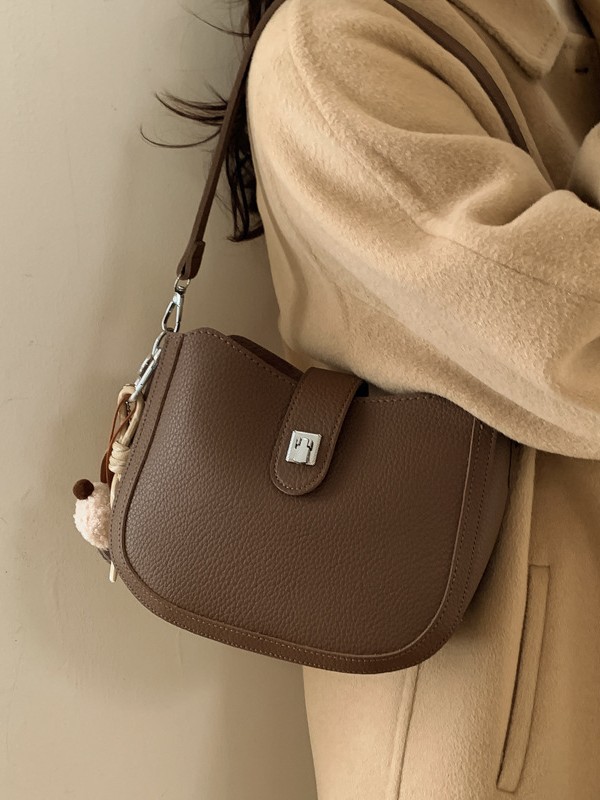 Hot sale nuevo nicho coreano litchi estampado bolso de cubo de hombro para mujeres sensación de lujo ligero versátil bolso de transporte de viaje