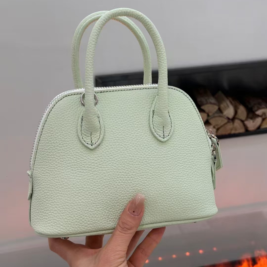 재고 도매 미니 정품 가죽 쉘 가방 2025 새로운 패션 핸드백 어깨 크로스 바디 작은 볼링 여성용 가방