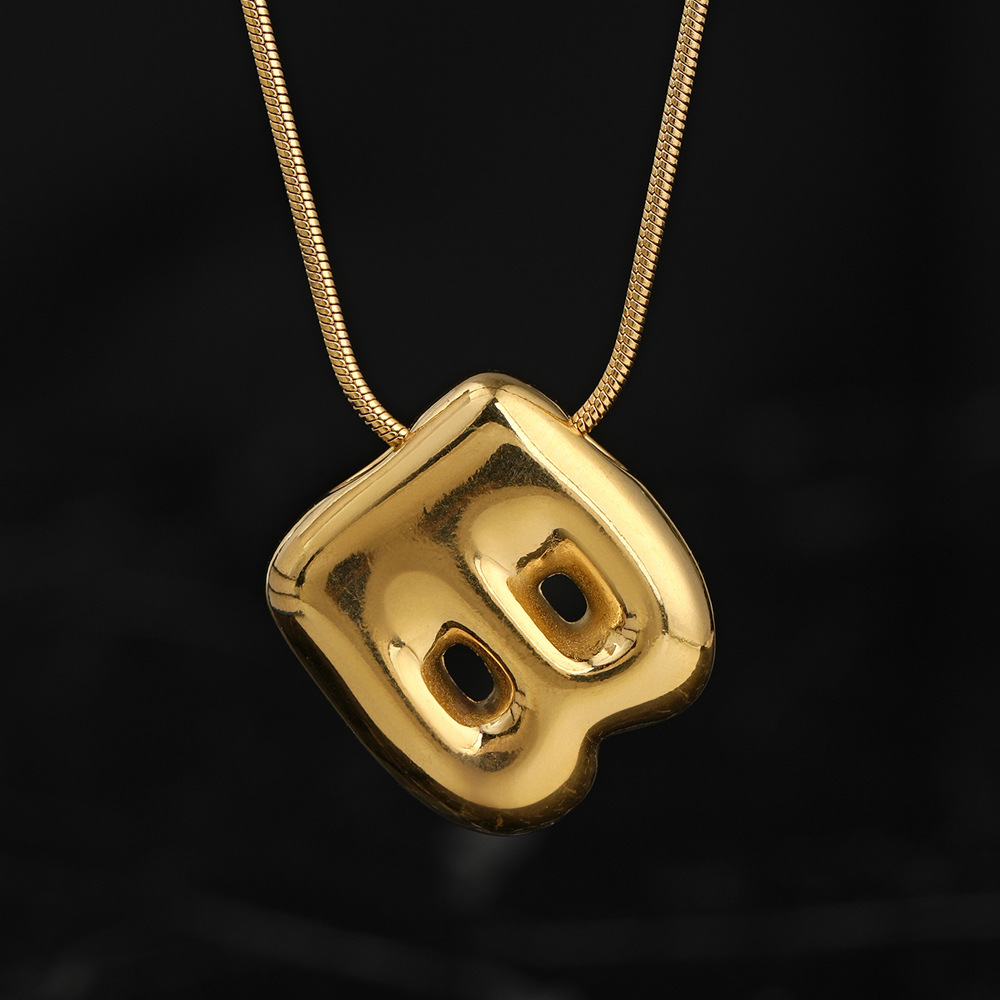 Colgante único venta cruzada de burbujas de fundición 26 collares de letras inglesas accesorios colgante DIY joyas de acero inoxidable