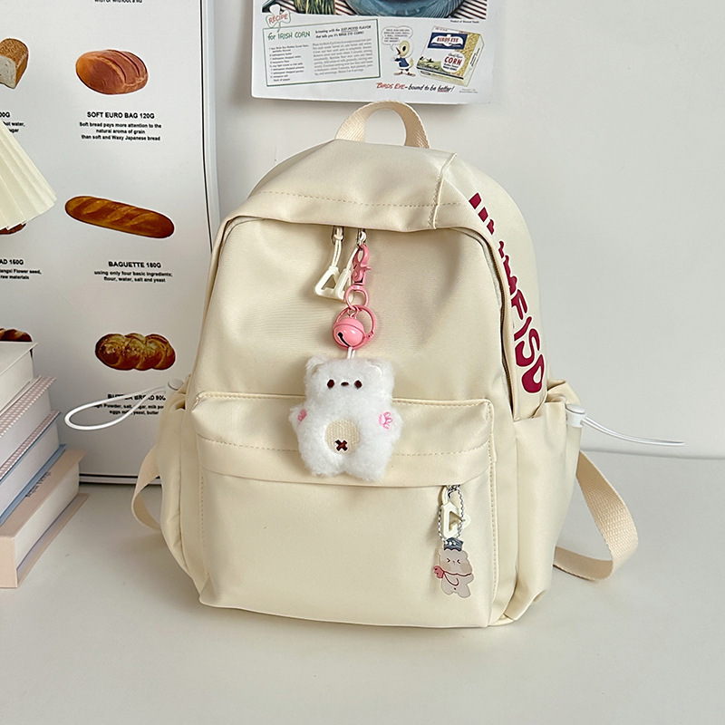 Mochila de gran capacidad para estudiantes de secundaria femenina simple y versátil para estudiantes de secundaria japonesa mochila de diseño