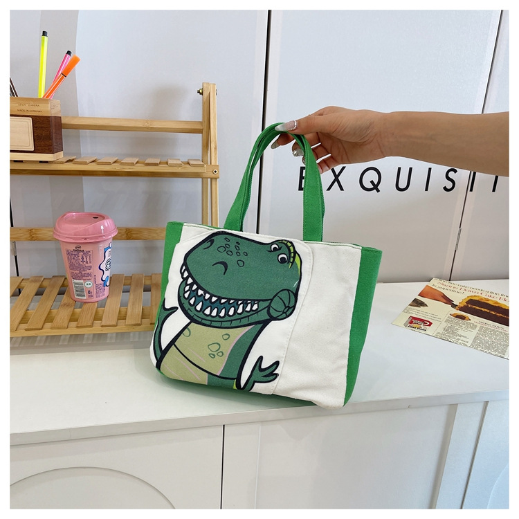 Cute cartoon printed small bag, 2024 summer new style hand-held piggy girl handbag, student storage canvas bag undefined